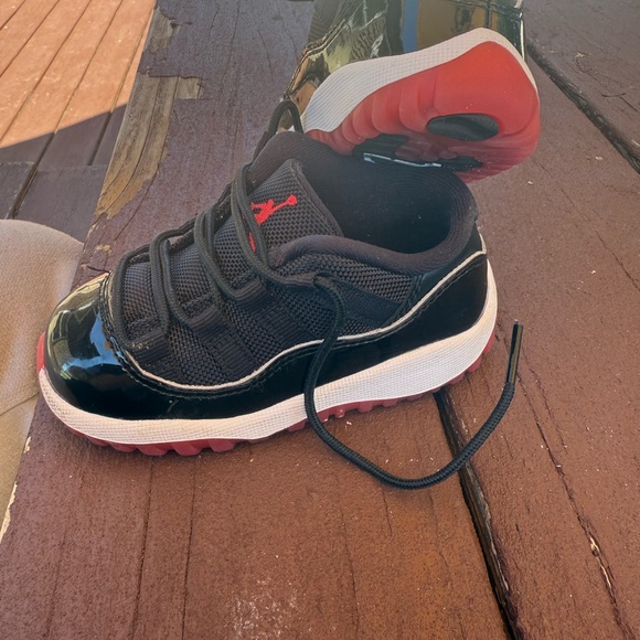 Jordan Kids Glossy Black and Red Sneakers - Picture 3 of 3
